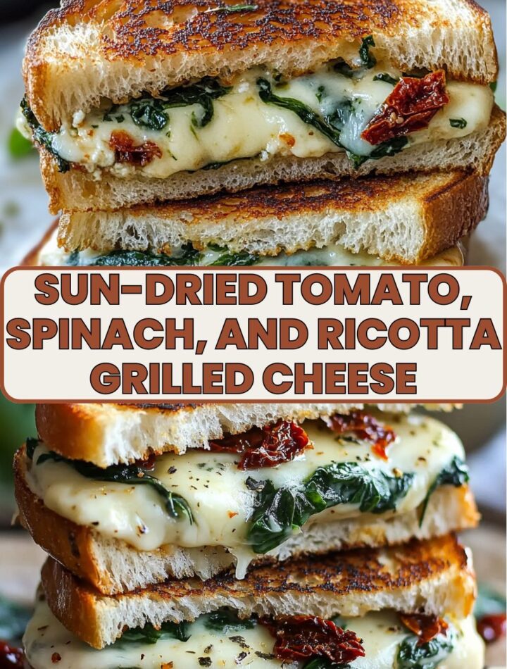 A close-up of a golden, crispy grilled cheese sandwich filled with melted mozzarella, creamy ricotta, sautéed spinach, and sun-dried tomatoes, stacked and cut in half to reveal the rich, gooey interior. The bread is perfectly toasted with a buttery finish, highlighting the vibrant green spinach and red sun-dried tomatoes.